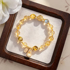 The Wealth Magnet: Golden Rutilated Quartz Pi Xiu Bracelet for Financial Success & Good Fortune