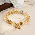 The Wealth Magnet: Golden Rutilated Quartz Pi Xiu Bracelet for Financial Success & Good Fortune